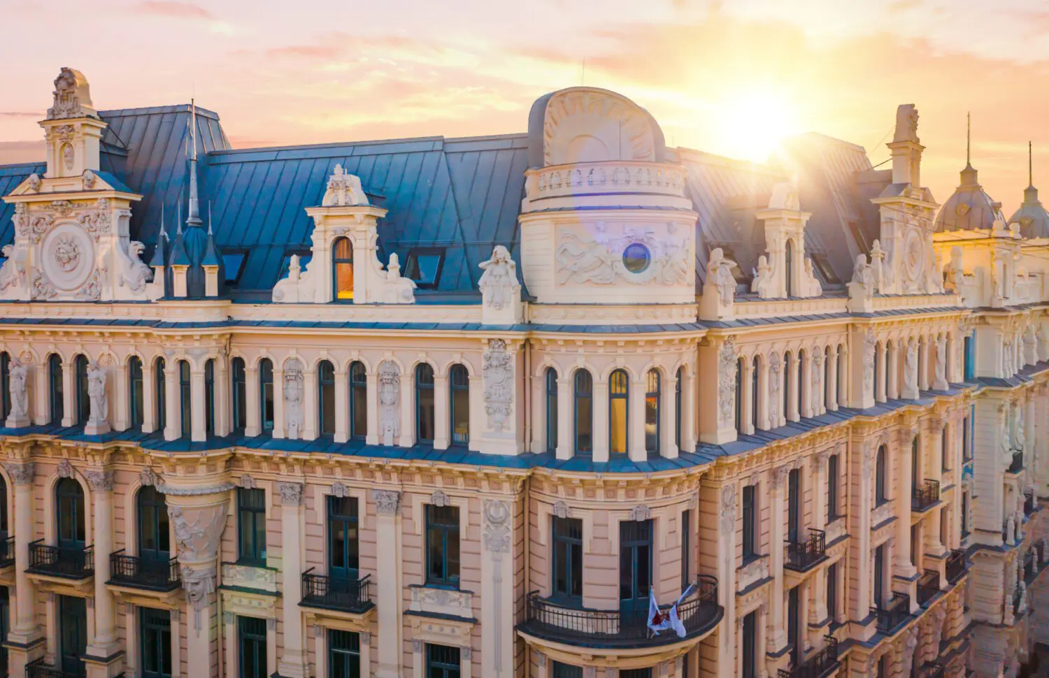 The Art Nouveau spires and Baroque rooftops of Rīga at dawn